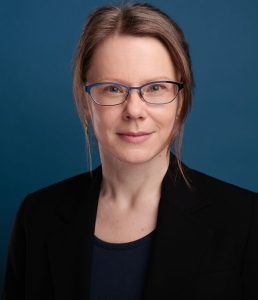 Headshot of Eleanor Howe. She looks super professional.